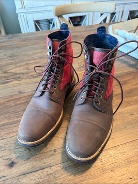 Cole Haan men’s lace up boots.